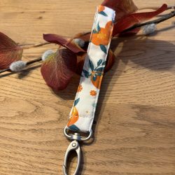 Schlüsselband mit großem Karabinerhaken für´s Handgelenk - weißer Stoff mit Orangen