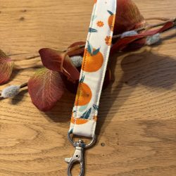 Schlüsselband mit Karabinerhaken für´s Handgelenk - weißer Stoff mit Orangen