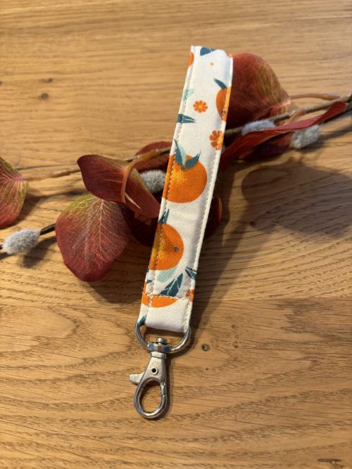 Schlüsselband mit Karabinerhaken für´s Handgelenk - weißer Stoff mit Orangen